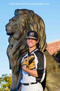 Senior Baseball picture with mascot stature at school